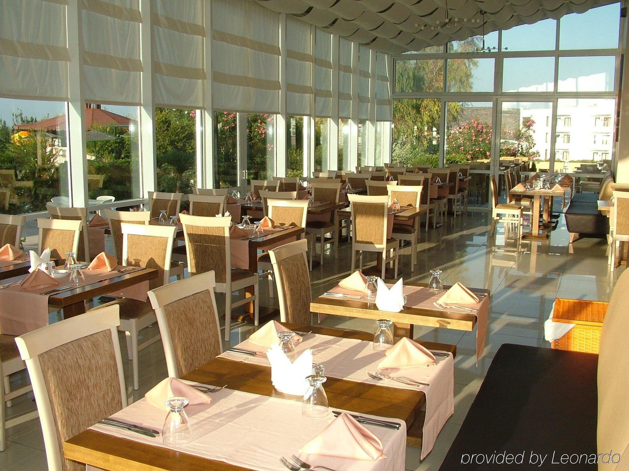 Babaylon Hotel Cesme Restaurante foto